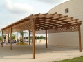 Pergola centinata con grigliati sottotrave.jpg